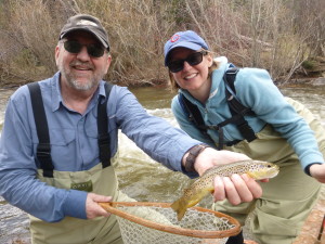 Moving on up in altitude to better clarity water. Good teamwork as dad puts a net on his little girls catch.