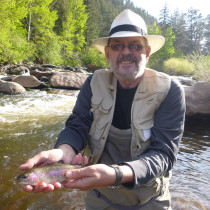 Peter with his first trout ever on the fly rod